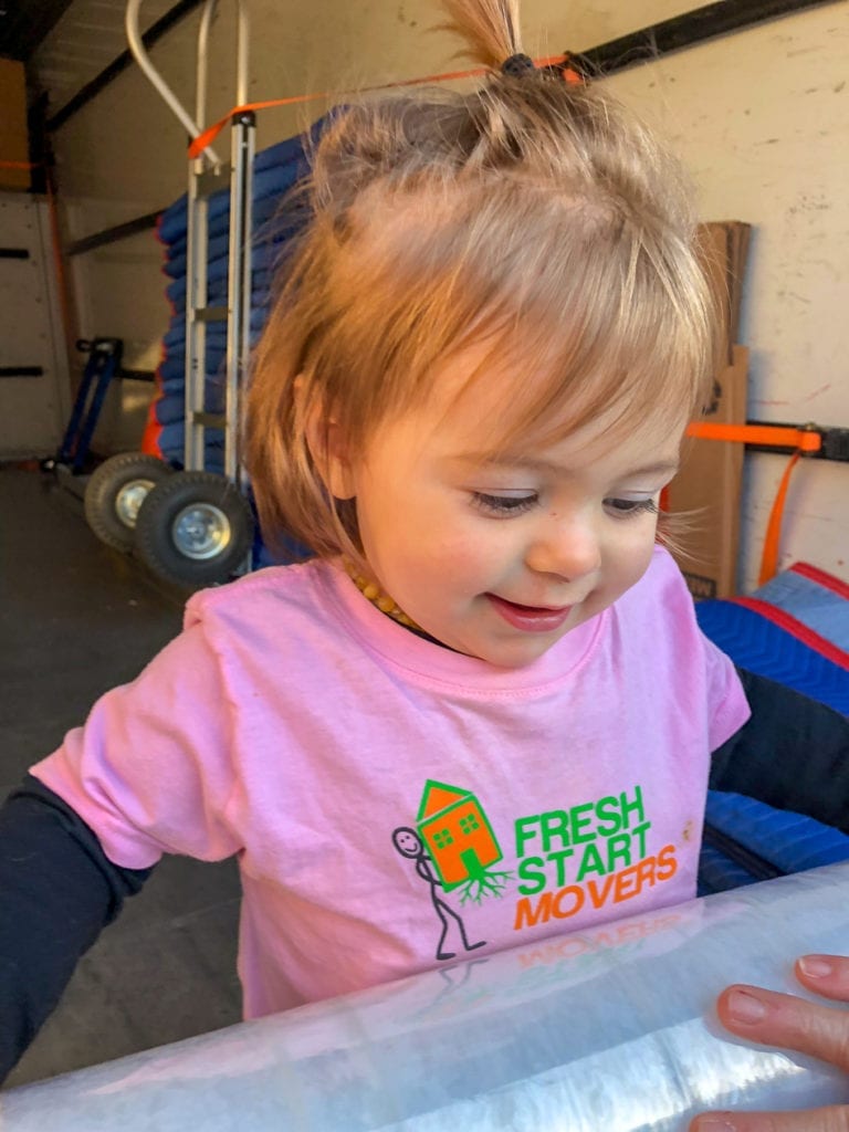 children moving while wearing Fresh Start Movers t-shirt in Santa Rosa, CA